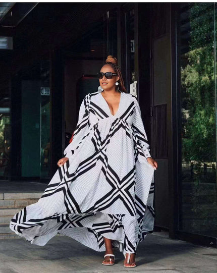 Geometric maxi dress with deep V neckline, black-and-white geometric pattern