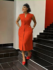 Orange-red sleeveless midi dress with V-neck, front button placket and waist darts