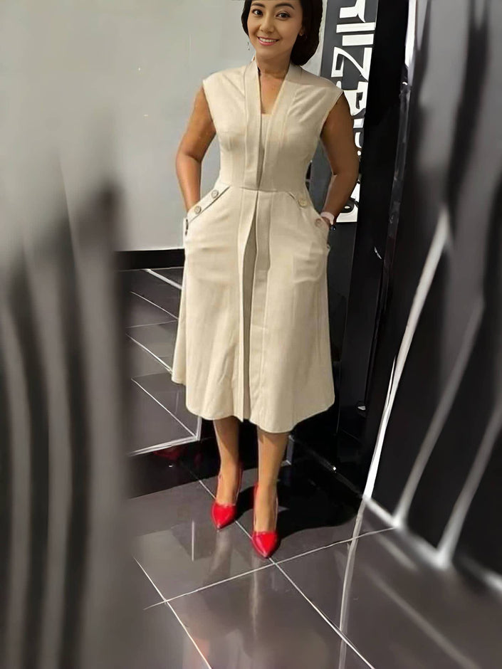 Beige sleeveless midi dress with V-neck, front button placket and waist seams