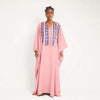 Pink kaftan maxi dress with blue geometric fringe at V-neck