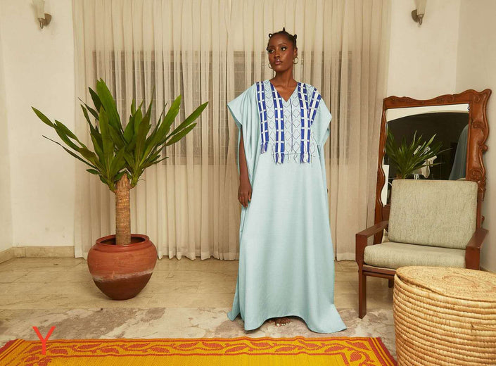 Mint-green kaftan maxi dress with blue geometric fringe at V-neck
