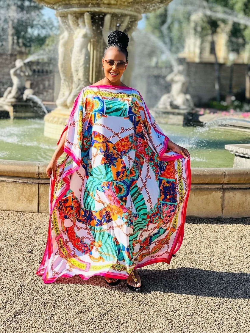Plus size printed kaftan dress with multicolor abstract pattern, wide sleeves, loose fit