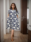 Plus size geometric dress with loose fit, short sleeves, navy and white pattern
