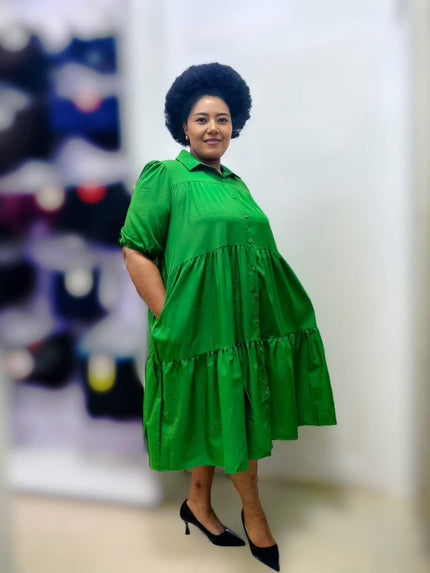 Bright green plus-size midi ruffle dress with short sleeves, tiered skirt, button front