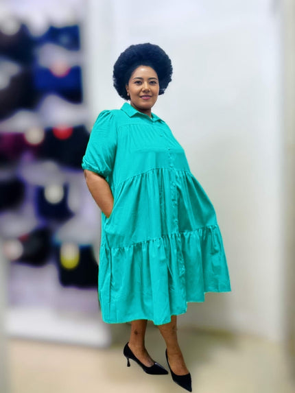 Green plus-size midi ruffle dress with short sleeves and button-front yoke