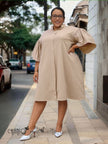 Plus size ruffle sleeve dress in tan with button neckline and loose A-line fit