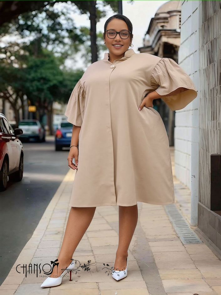 Plus size ruffle sleeve dress in tan with button neckline and loose A-line fit