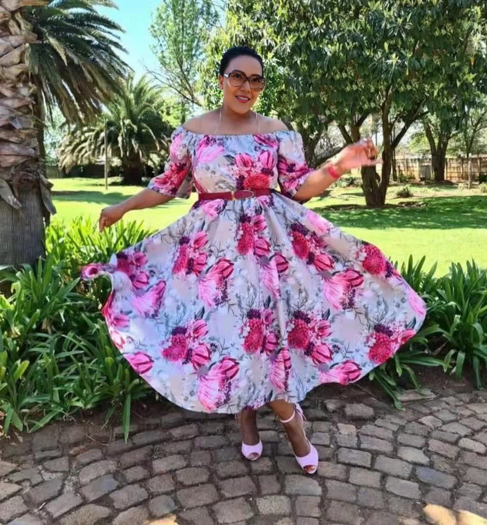Off-shoulder floral dress, pink and blue blooms, gathered waist, puff sleeves