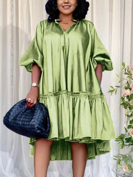 Ruffle hem party dress in light green with pleated bodice and ruffle hem