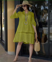 Plus size green-yellow lace-hem casual dress with tiered skirt and long sleeves