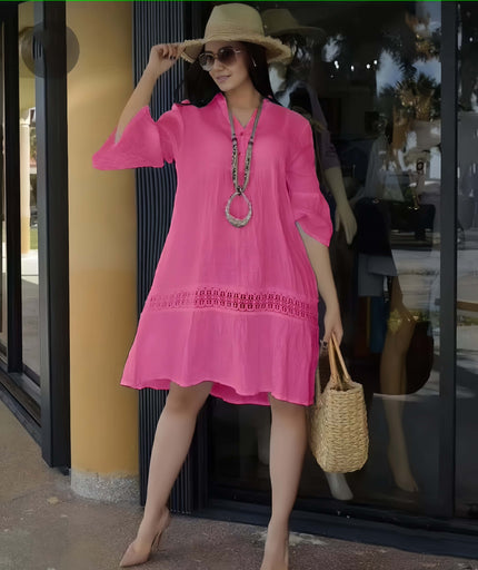 Plus size pink lace-hem casual dress with tiered skirt and long sleeves