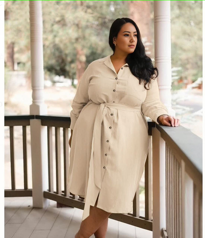 Beige belted shirt dress, long sleeves, button front, midi length.