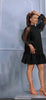 Modern Sheer Sleeve Dress with Dotted Detail and Ruffled Hemline