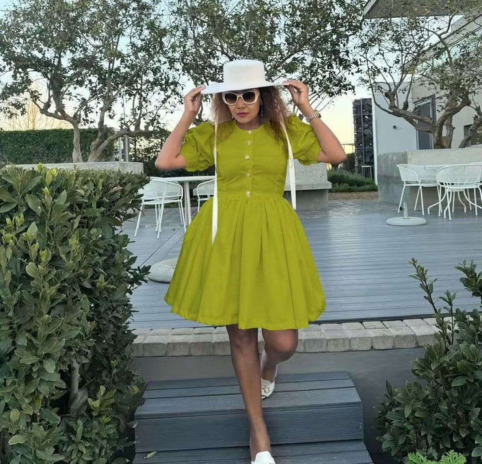 Yellow-green puff sleeve dress with button front and flared skirt