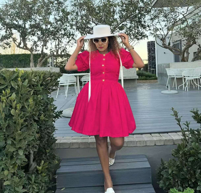 Red puff sleeve dress with button front and flared skirt