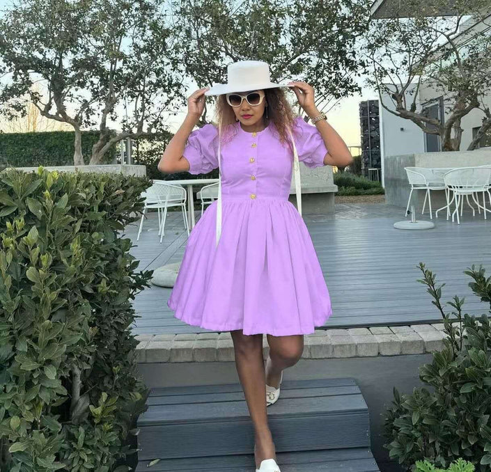 Light-purple puff sleeve dress with button front and flared skirt