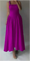 Magenta pleated maxi dress with square neckline, gathered straps, and full skirt