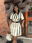 Cream-and-black striped V-neck dress with short sleeves and lace-look neckline trim