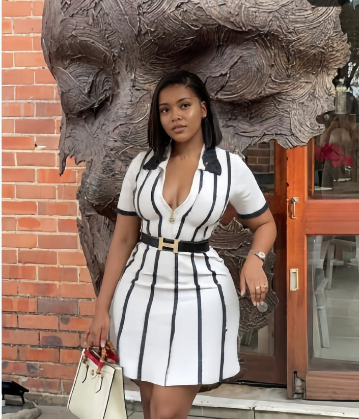 White-and-black vertical striped V-neck dress with short sleeves and waist belt