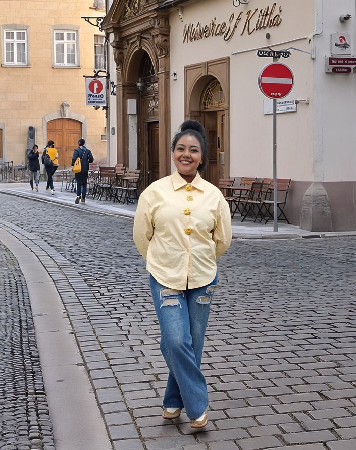 Cream vintage style shirt with gold buttons, long sleeves and stand collar