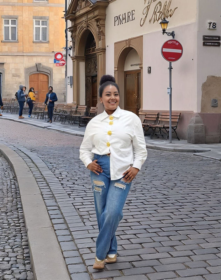 White vintage style shirt with gold buttons, long sleeves and stand collar