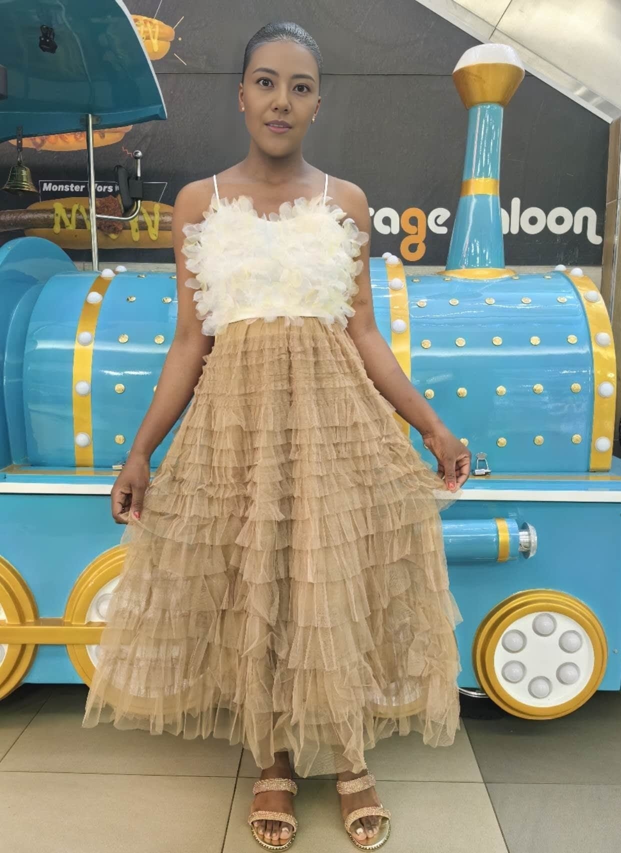 Burlywood layered pleated midi skirt with ruffle tiers and elastic waistband