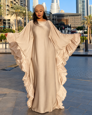Light beige loose maxi dress with large ruffled sleeves and relaxed fit