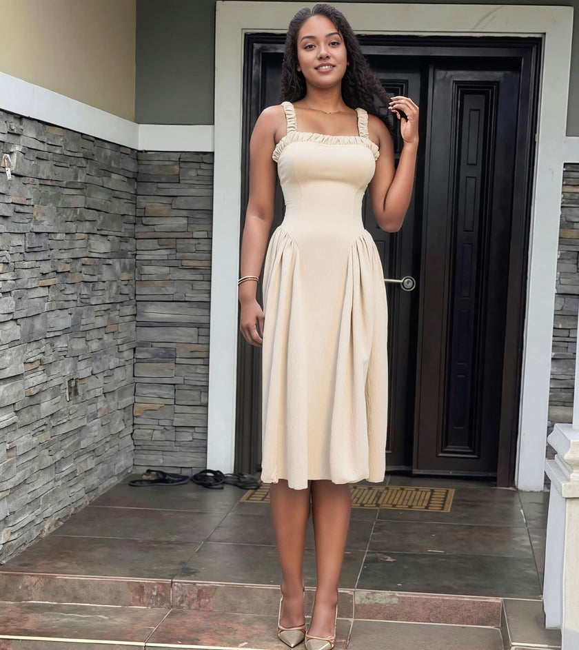 Nude pleated maxi dress with square neckline and gathered straps