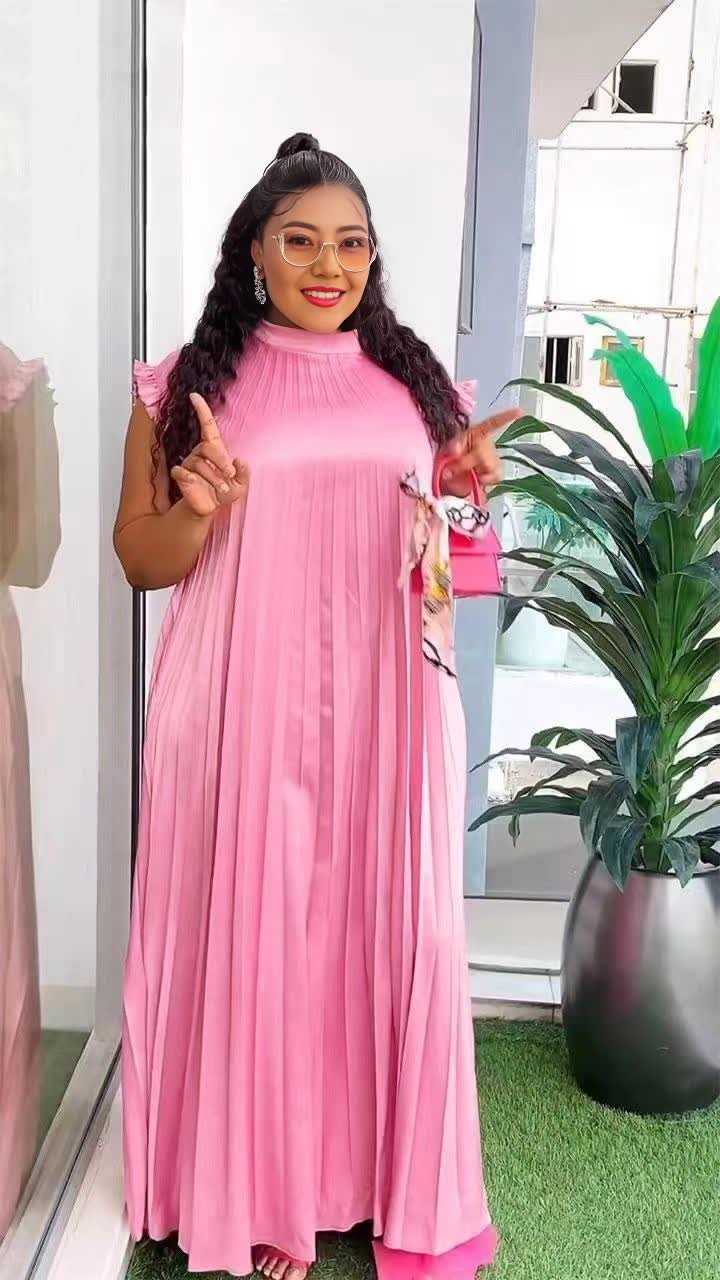 Light-pink pleated maxi dress with gathered bodice, sleeveless look