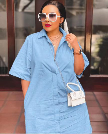 Loose-fit midi shirt dress, light blue, button collar and short sleeves.
