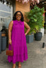 Magenta sleeveless maxi dress with bow neckline and tiered ruffle hem