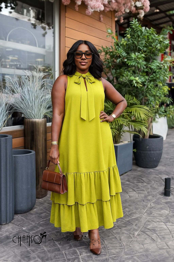 Lime yellow sleeveless maxi dress with bow neckline and tiered ruffle hem