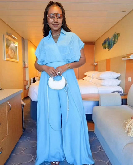 Light blue wide-leg jumpsuit with V-neck and adjustable tie waist