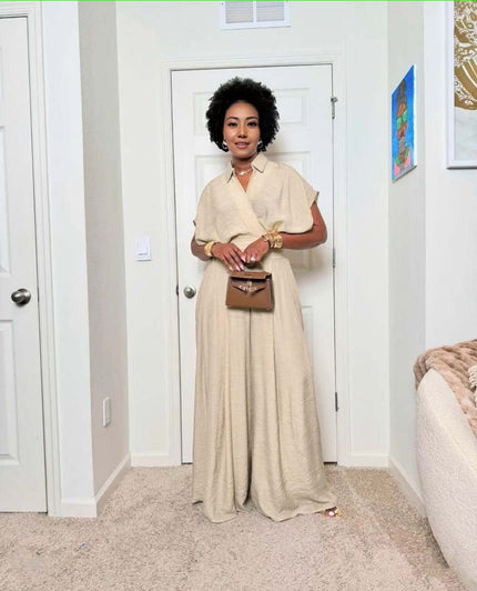 Beige wide-leg jumpsuit with V-neck and adjustable tie waist
