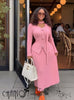 Pink knit twin set with long-sleeve cardigan and maxi skirt with ruffle trim
