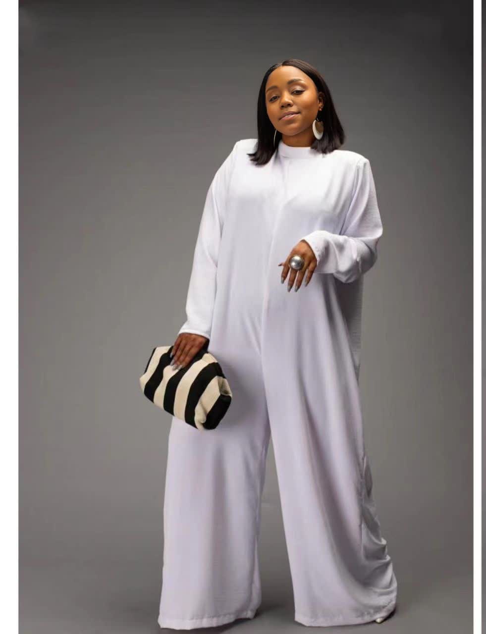 White relaxed-fit jumpsuit with long sleeves and wide-leg pants