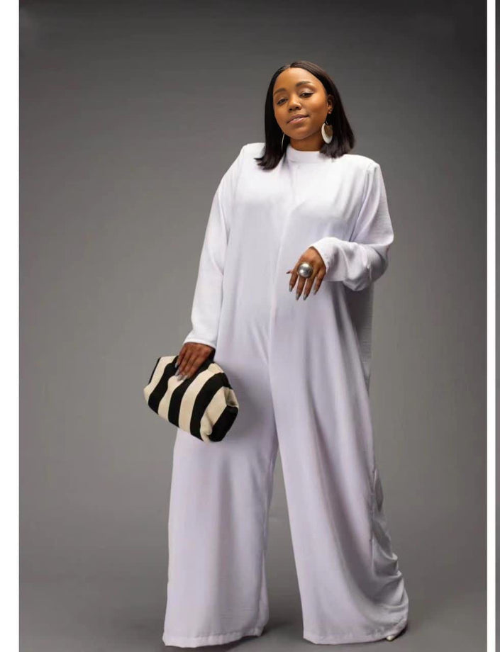 White relaxed-fit jumpsuit with long sleeves and wide-leg pants