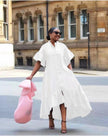White midi shirt dress with puff sleeves and tiered ruffle skirt