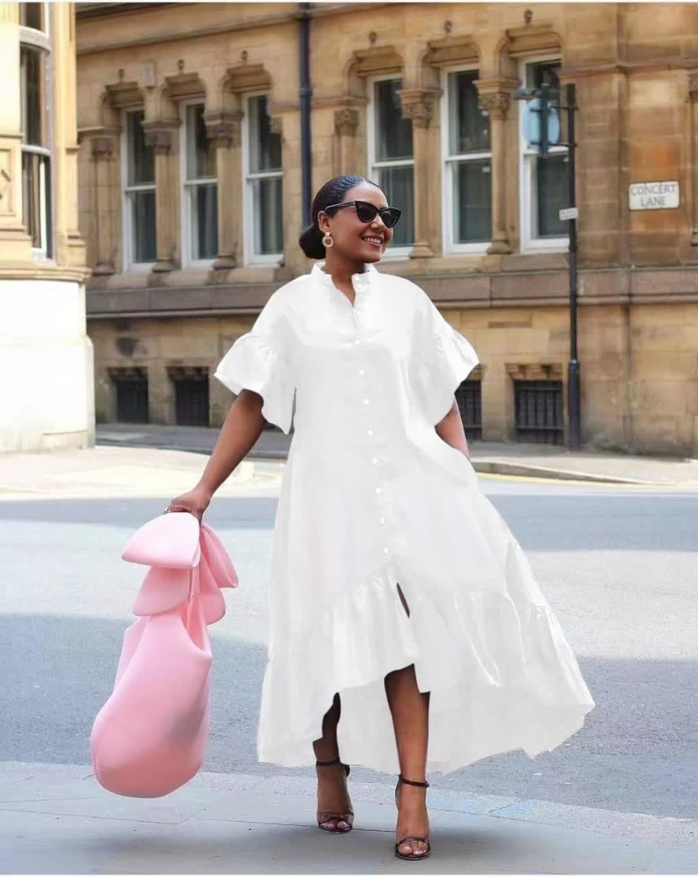 White midi shirt dress with puff sleeves and tiered ruffle skirt