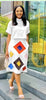 Geometric print midi skirt, white base with red, blue, yellow diamond accents