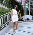 White sleeveless waist-tie two-piece set with shorts
