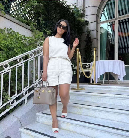 White sleeveless waist-tie two-piece set with shorts