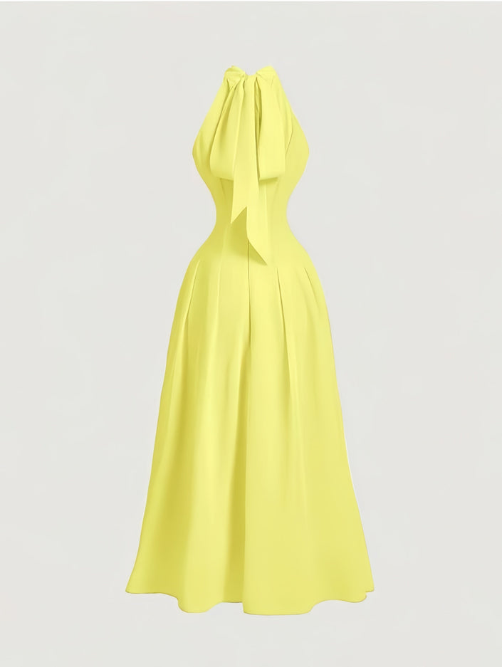 Light yellow halter midi dress with button bodice and pleated, full skirt