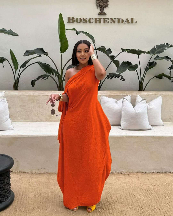 Orange-red one-shoulder maxi dress, layered loose fit with draped skirt