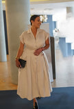Tan button-front midi dress with lapel collar and side slit