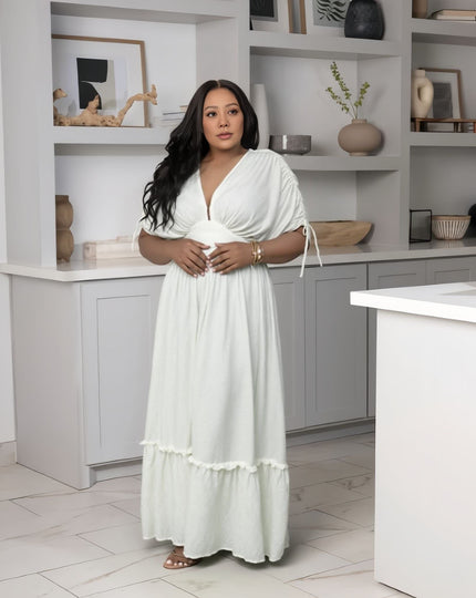 White maxi dress with gathered waist and tiered ruffle hem, V-neck