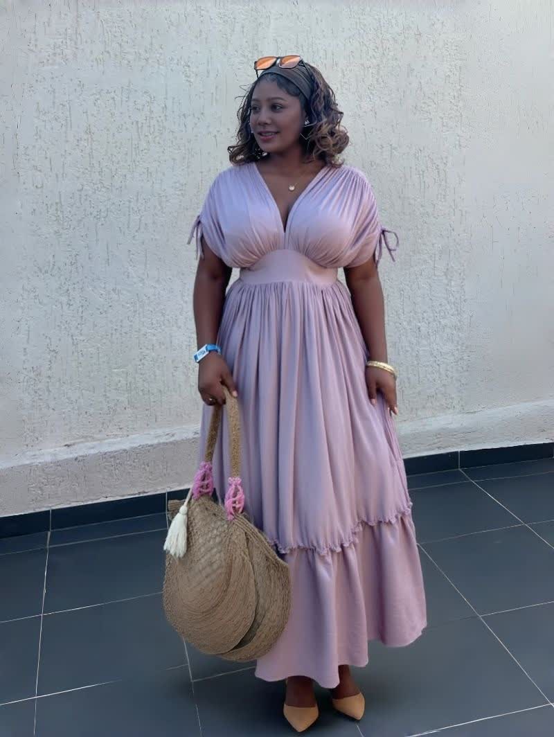 Light pink maxi dress with gathered waist and tiered ruffle hem