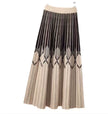 Pleated knit skirt with geometric diamond and vertical stripe pattern, dark and beige.