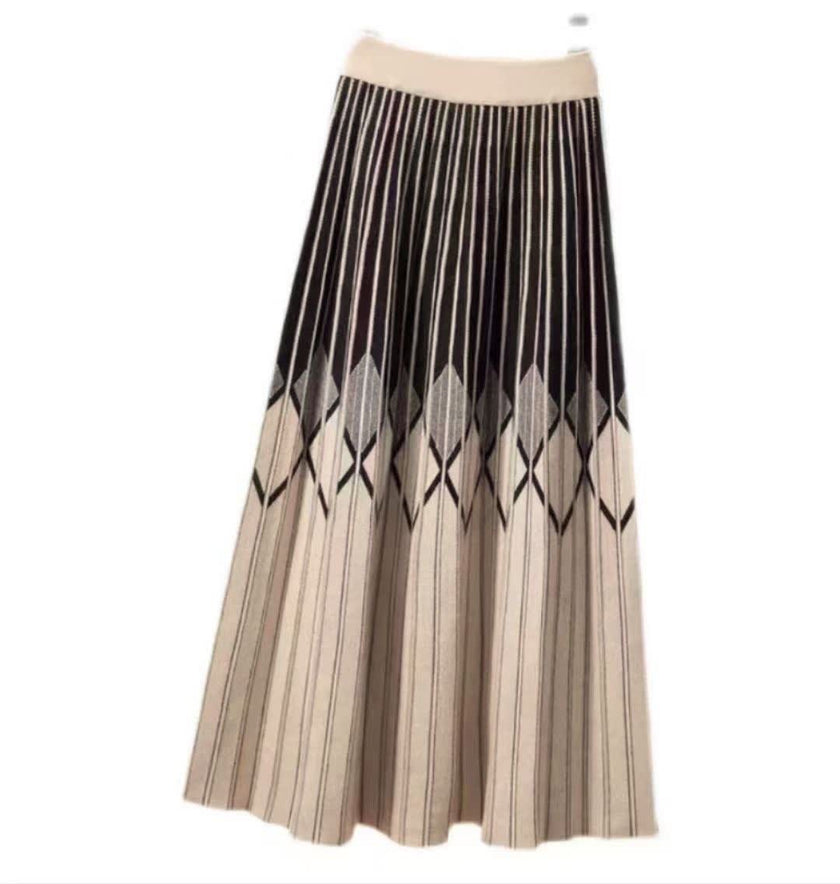 Pleated knit skirt with geometric diamond and vertical stripe pattern, dark and beige.