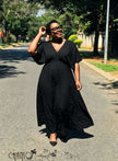 Black V-neck short-sleeve maxi dress with relaxed silhouette and flowy skirt